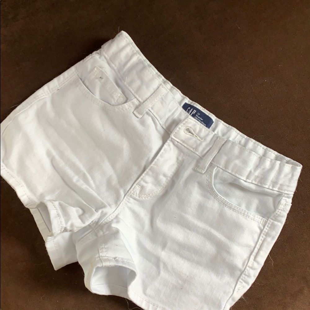 Selling ultra cool white jeans!